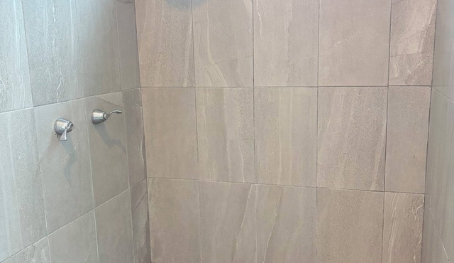 Private home with jacuzzi and large terrace steps from the beach