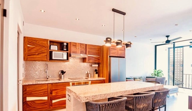 Stunning 2-bedroom condo with rooftop pool & walking distance beach in Huatulco.