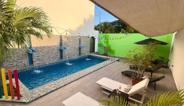 SWEET HOME steps from the beach & ferry to Isla Mujeres. With Pool & rooftop