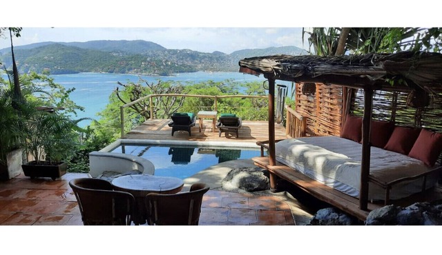 Tropical Artist's Bungalow with panoramic sea and bay views and private pool.