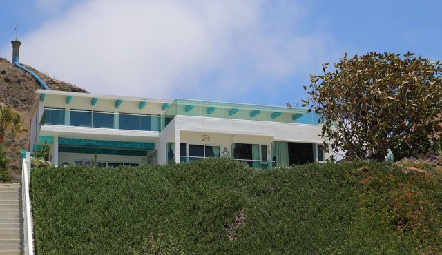Two bedroom, two bath beach house on wide sandy beach.