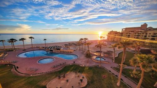 Two-Story 2-Bedroom Beachfront Penthouse at Princesa Resort - BeachBumCondos