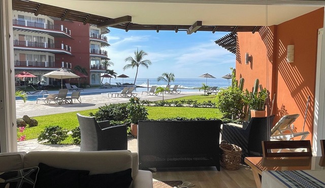 Walk out to pool and ocean steps away.
