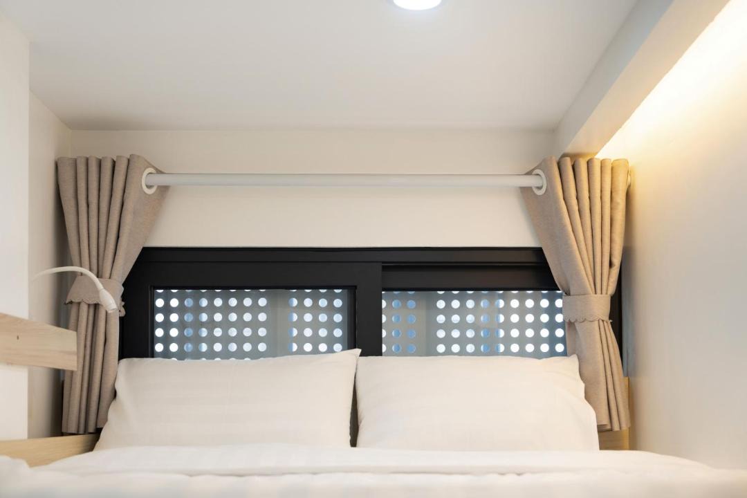 Photo of Bedroom in Hanoi Backpacker Quarter
