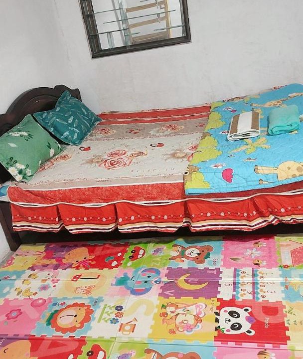 Photo of Bedroom in Hanoi Backpacker Quarter