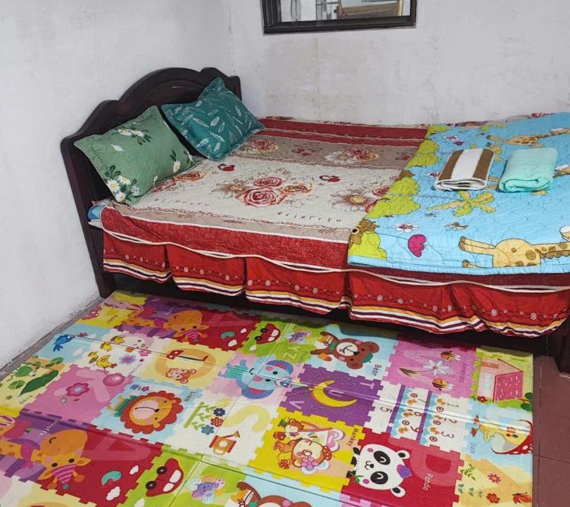 Photo of Bedroom in Hanoi Backpacker Quarter