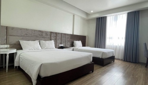 Deluxe Triple Room