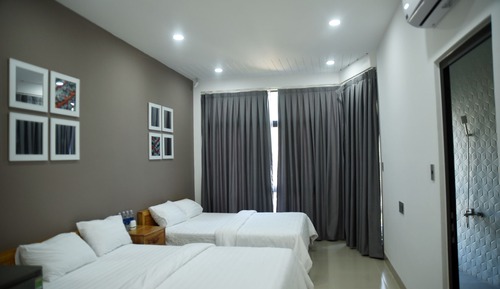 Deluxe Quadruple Room, 2 Queen Beds, Beach View