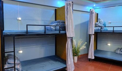 Single Bed in Dormitory Room