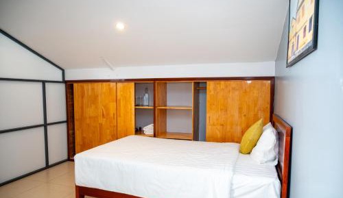 Single Bed in Dormitory Room